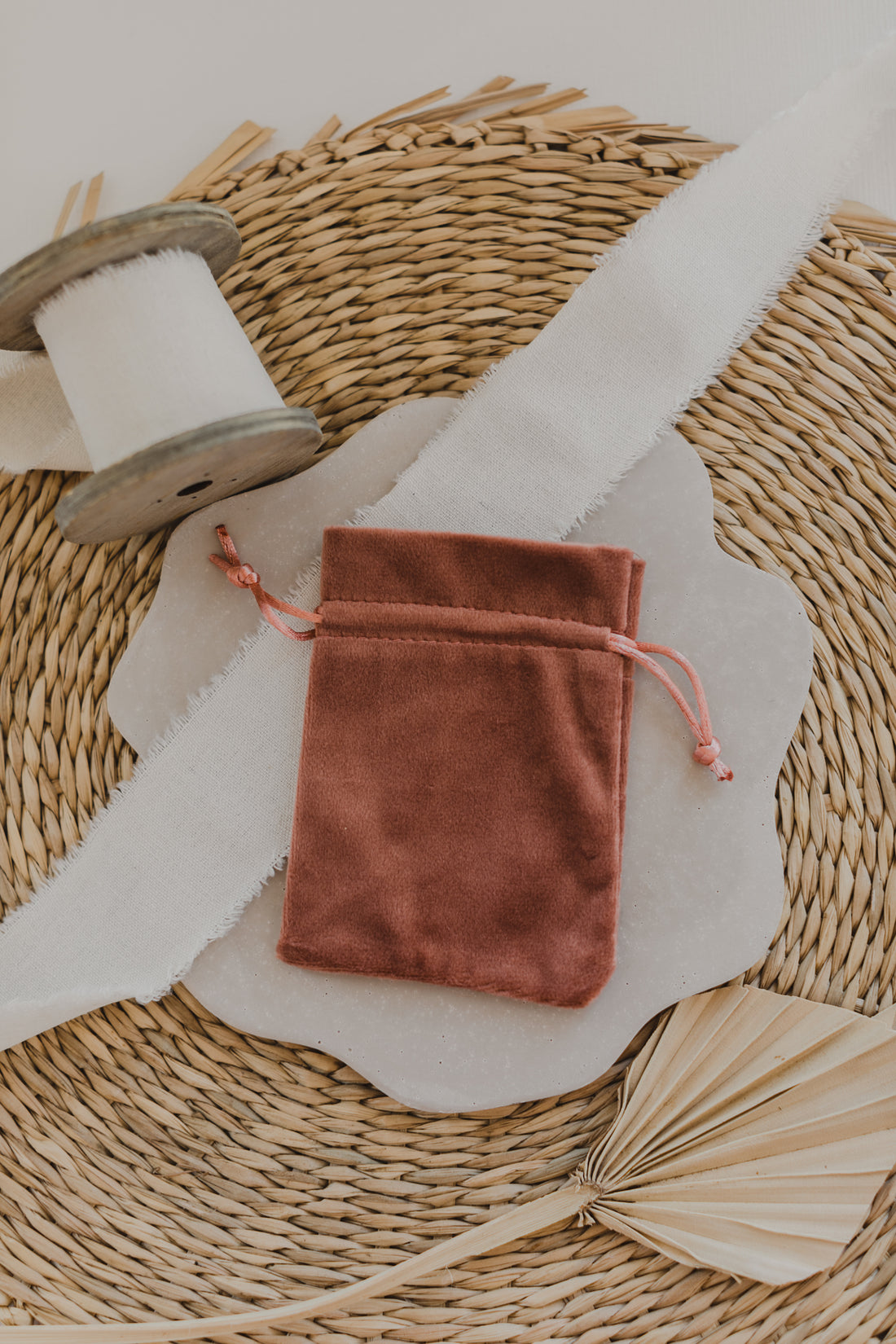 small golden paper bag with white dots