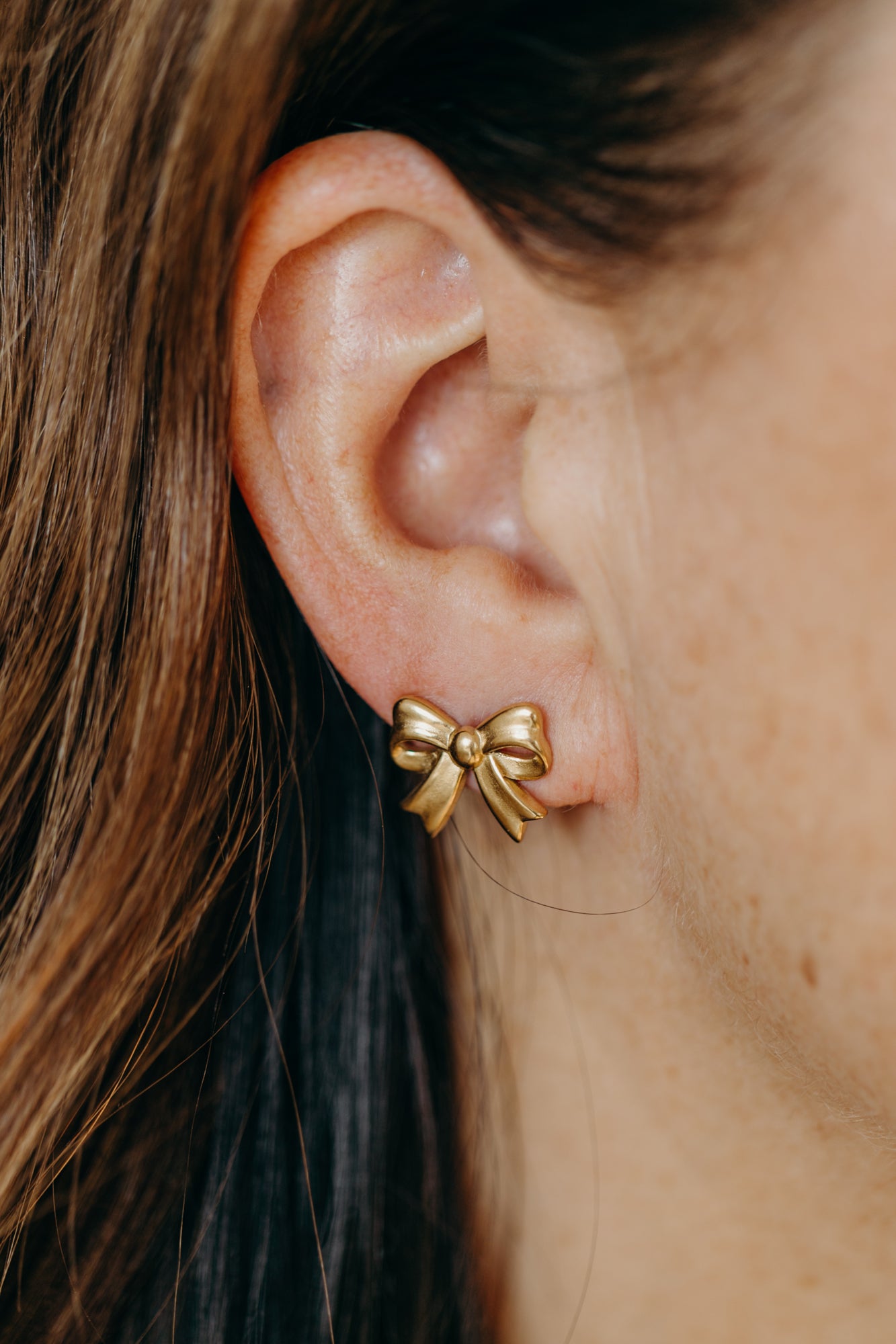 goldene Schleifen Ohrstecker aus Edelstahl