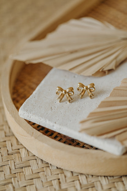 goldene Schleifen Ohrstecker aus Edelstahl