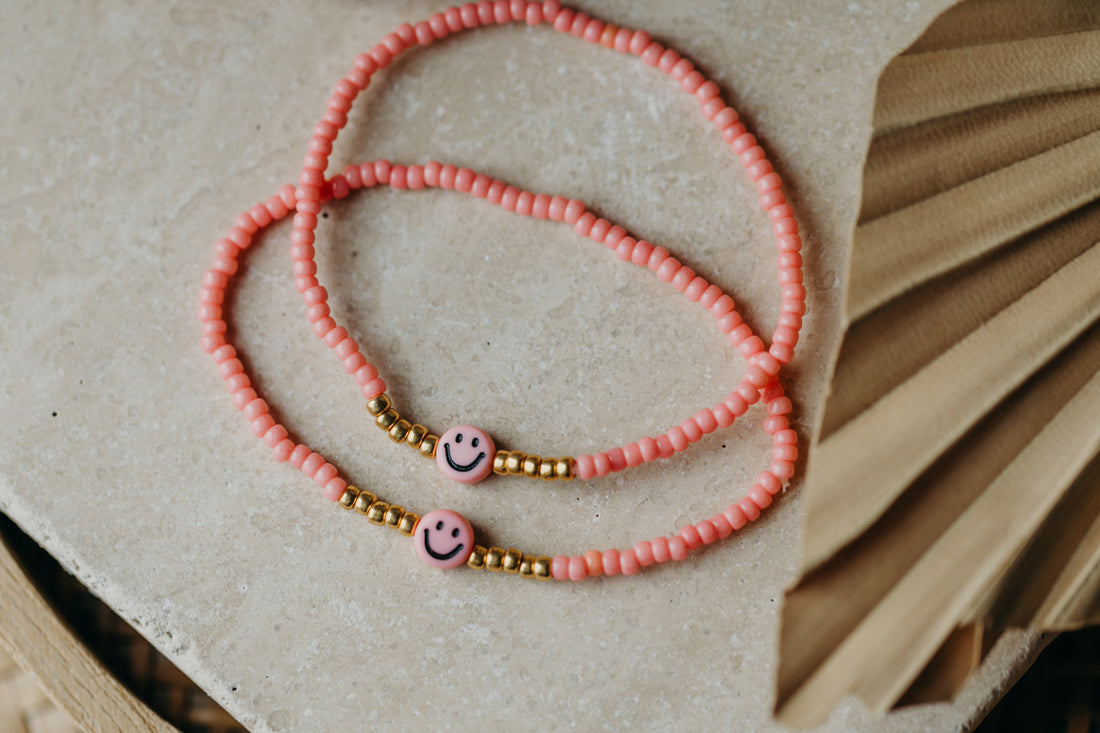 Smiley Armband in Koralle