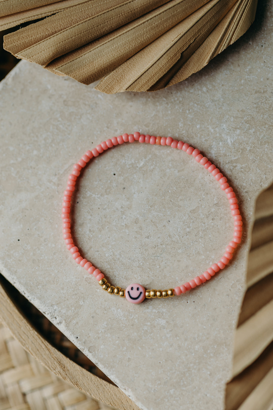 Smiley Armband in Koralle