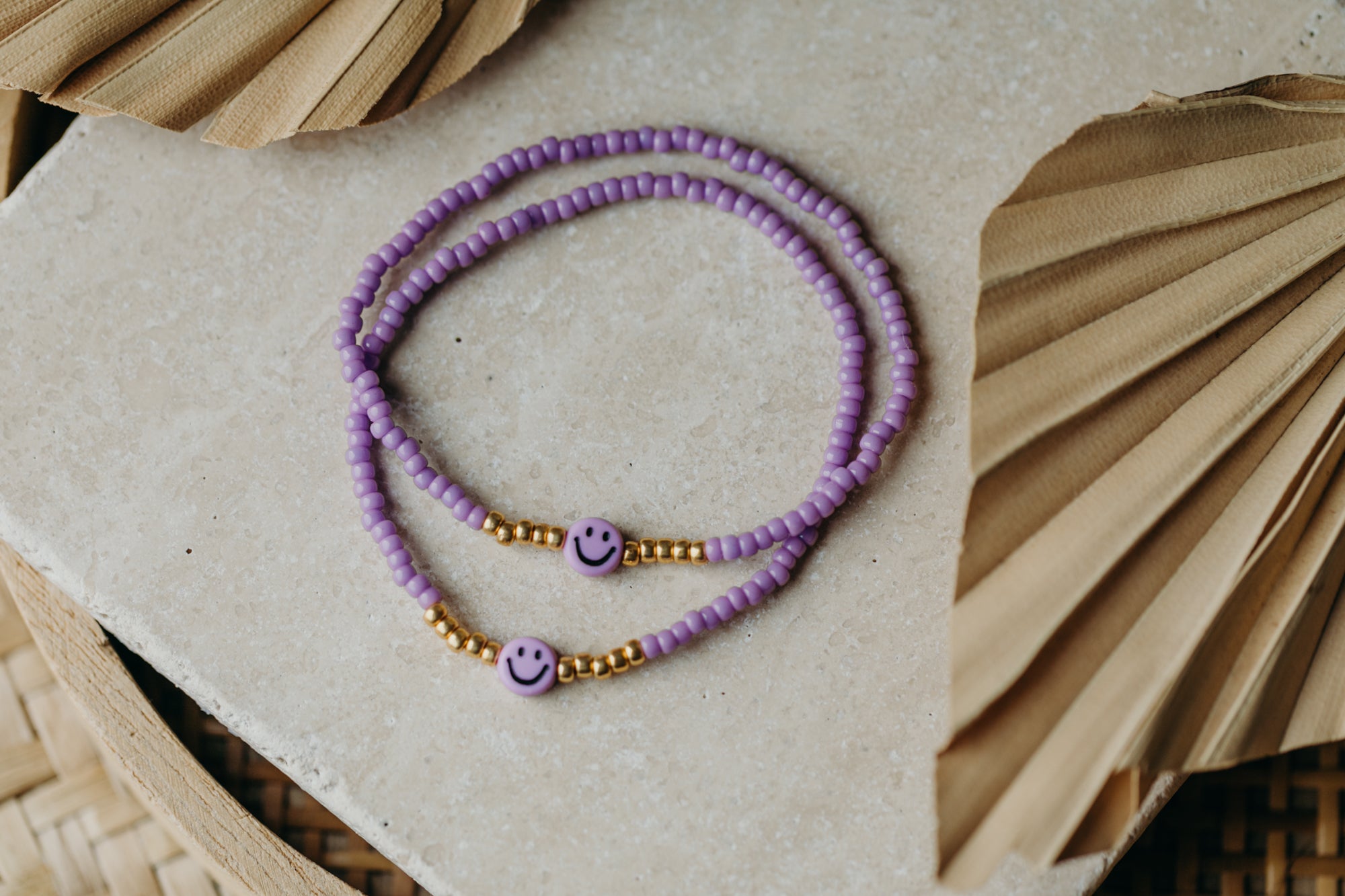 Lila Smiley Armband