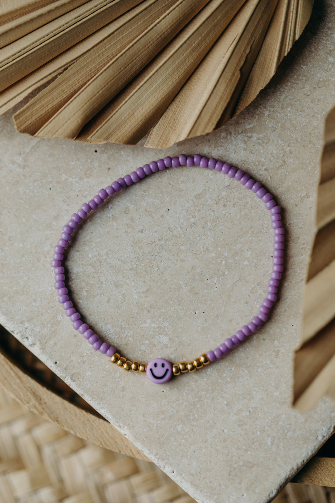 Lila Smiley Armband