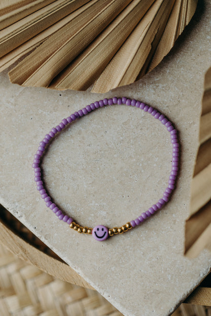 Lila Smiley Armband