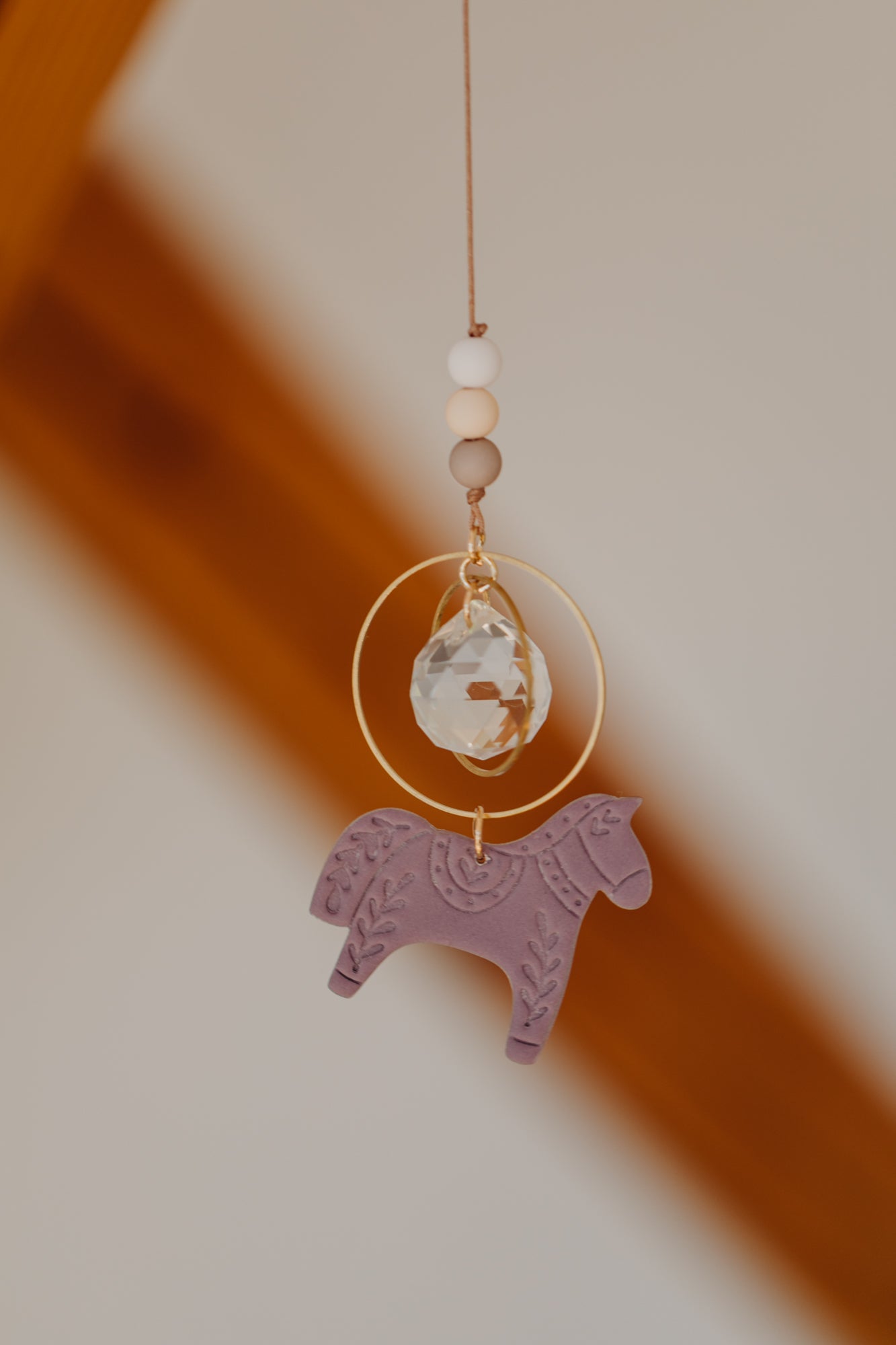 Sonnenfänger mit kleinem Pferd