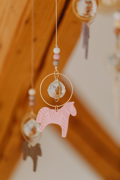 Sonnenfänger mit kleinem Pferd