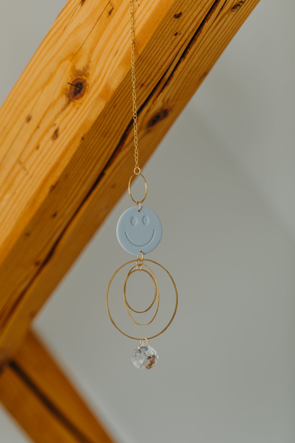 Sun catcher SMILEY light blue