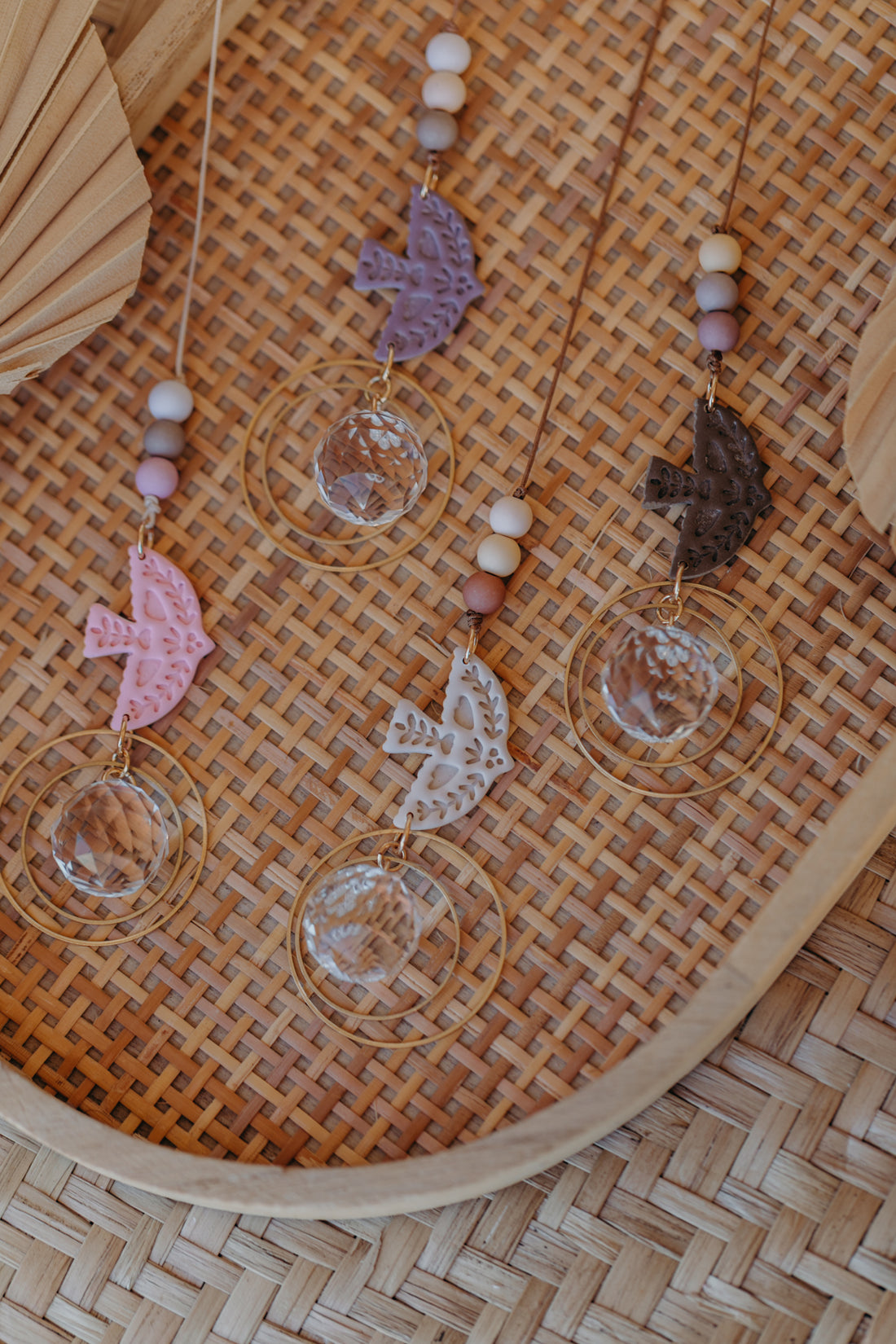 Sonnenfänger mit kleinem Vogel