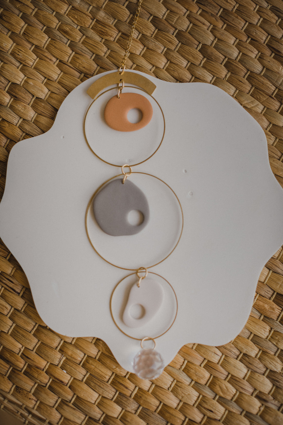 Suncatcher made of polymer clay, brass elements and rainbow crystal