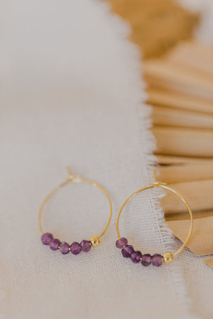 filigree creole made of titanium with amethyst pearls purple