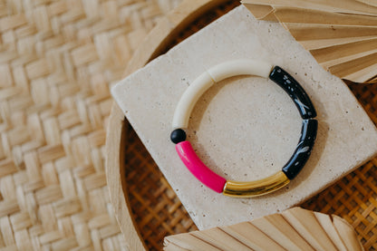 Perlenarmband 012 mit Tube Perlen in Gold, Creme, Dunkles Pink und Schwarz