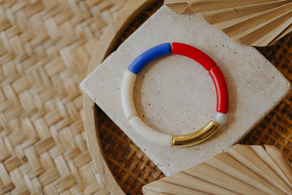 Perlenarmband 013 mit Tube Perlen in Gold, Creme, Rot und Blau