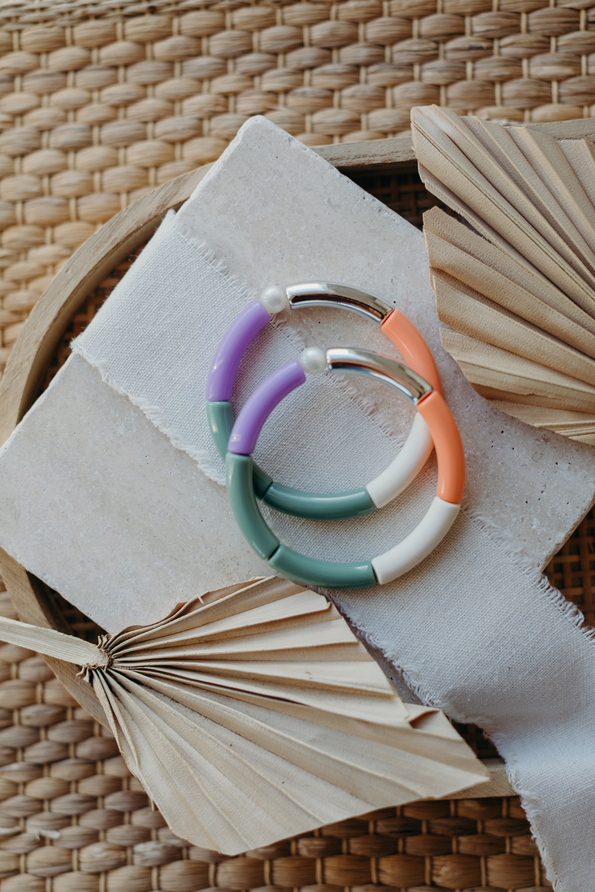 Pearl bracelet with tube beads in silver, green, orange and cream