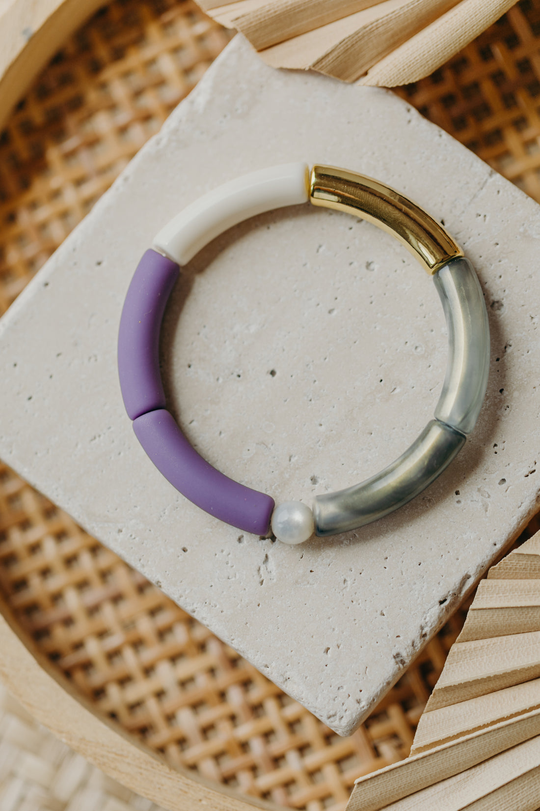 Pearl bracelet with tube pearls in gold, cream, yellow and purple