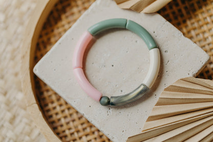 Pearl bracelet with tube pearls in gold, light brown, purple and white