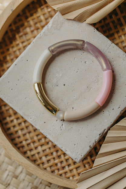 Pearl bracelet with tube pearls in gold, cream, yellow and purple