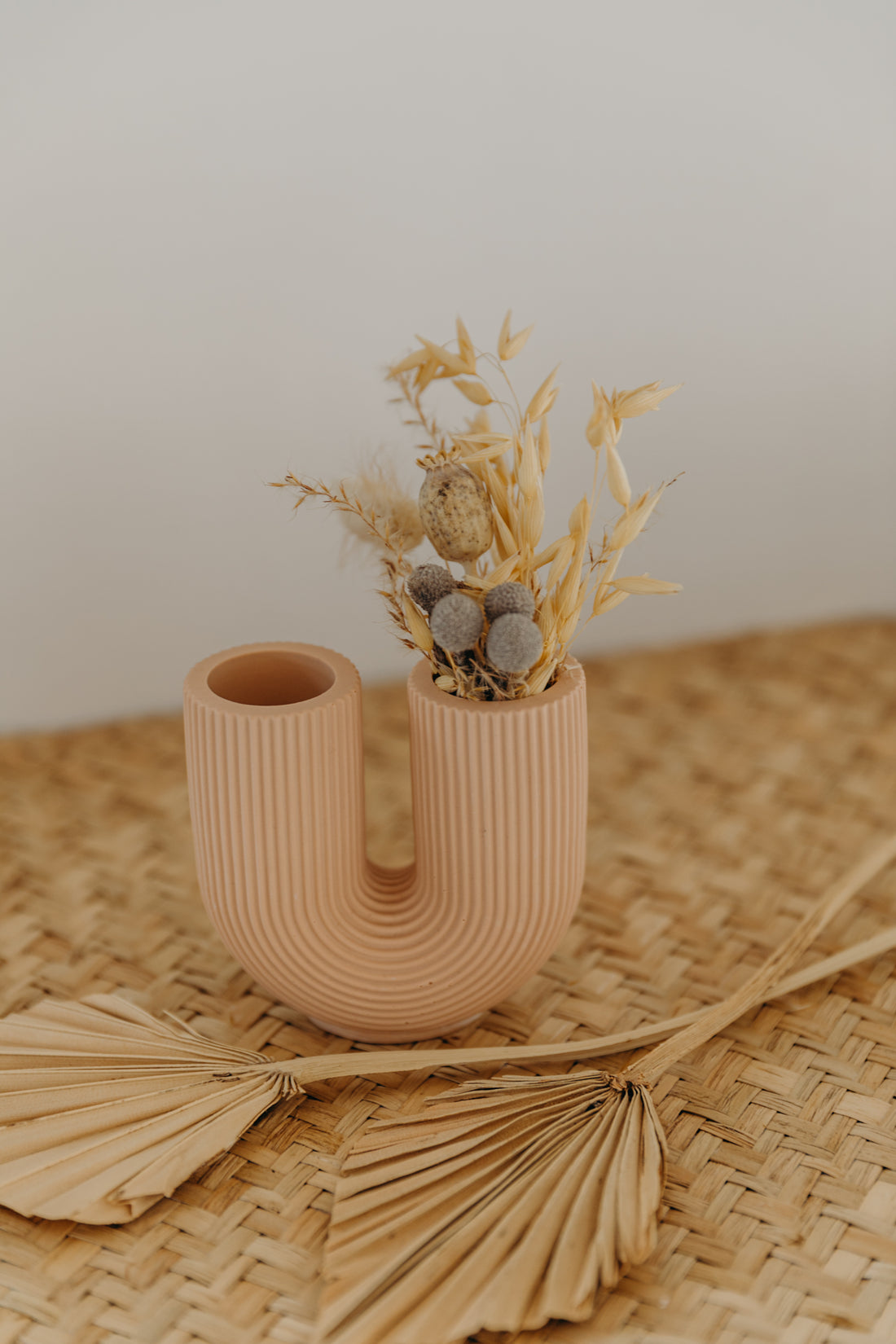 small old pink U-shaped vase