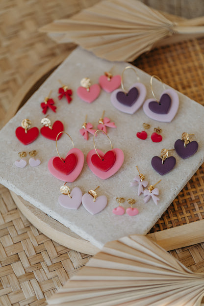 AMARA - zweifarbige Polymer Ton Creolen in Herzform (rosa-aubergine)