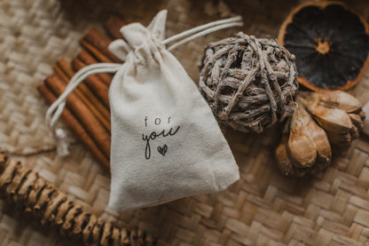 small golden paper bag with white dots