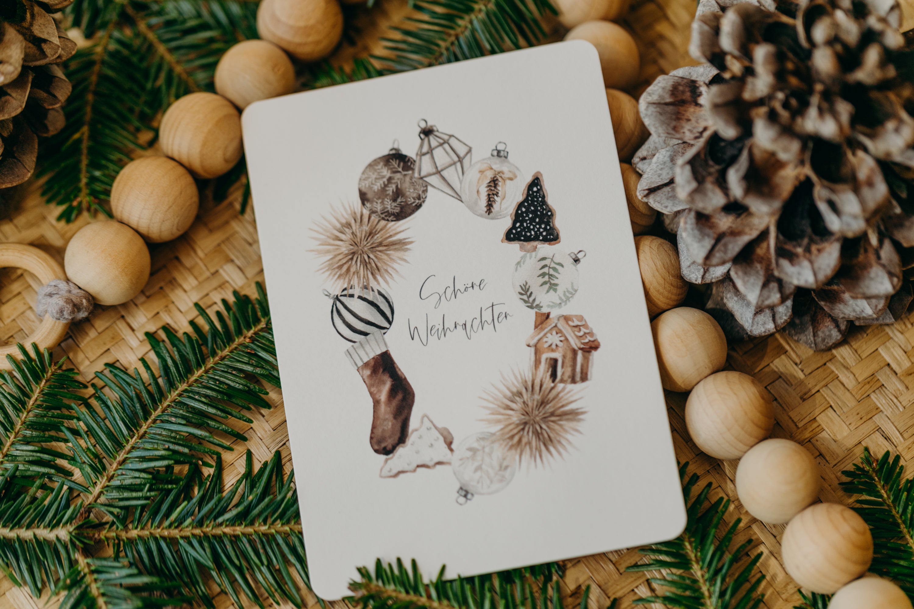 Christmas postcard wreath with various Christmas motifs
