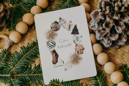 Christmas postcard wreath with various Christmas motifs