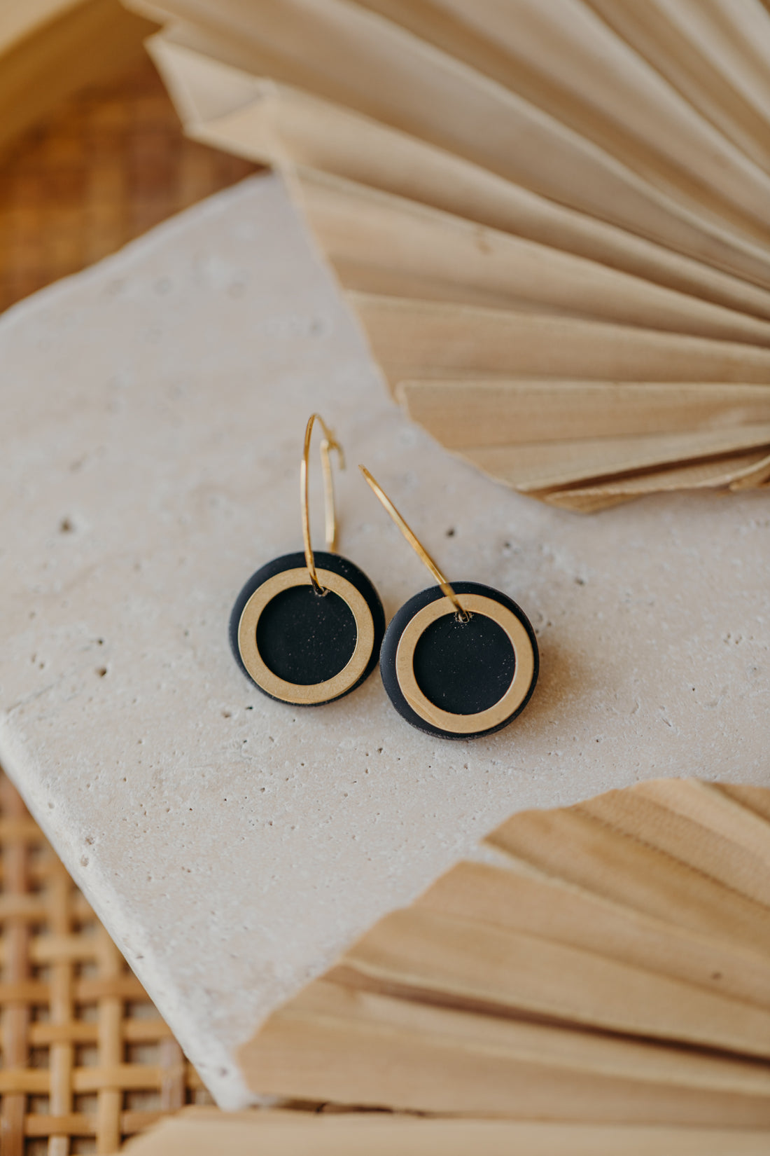 Hoop earrings with round polymer clay pendant and leaf